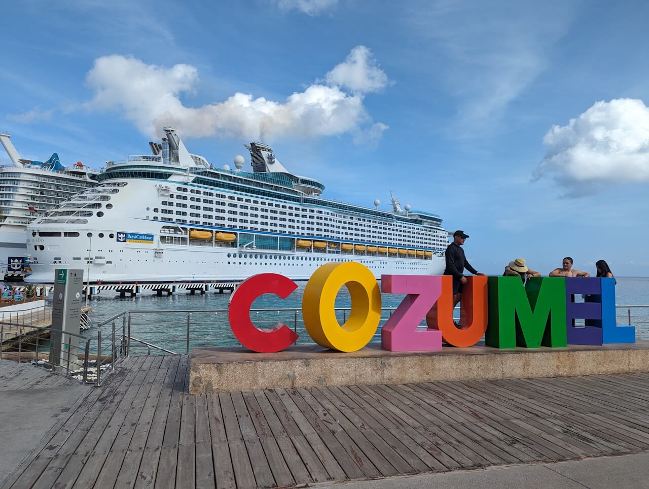Royal Caribbean Adventure of the Seas in Front of Cozumel sign